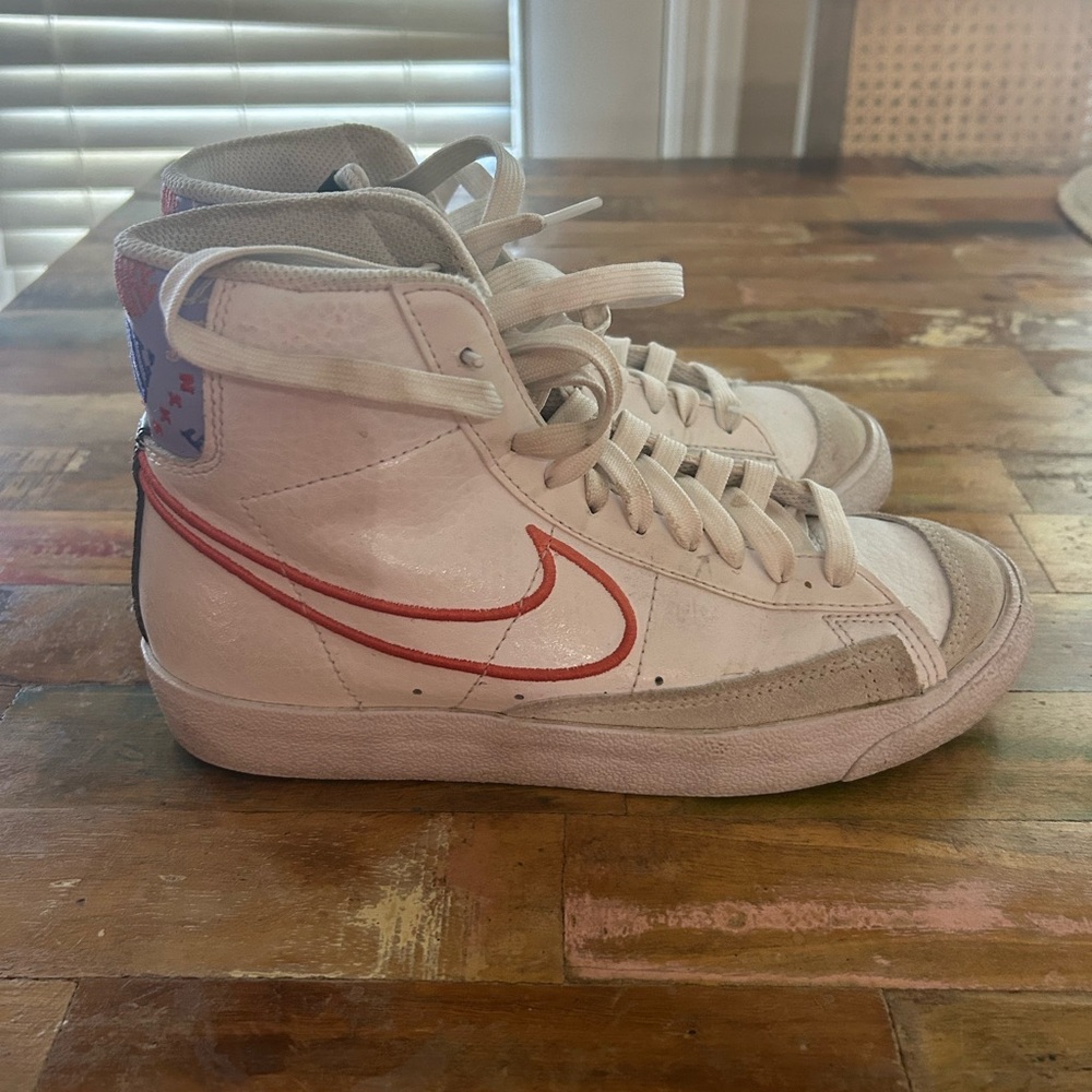 Nike High-Top Sneakers with Red Swoosh